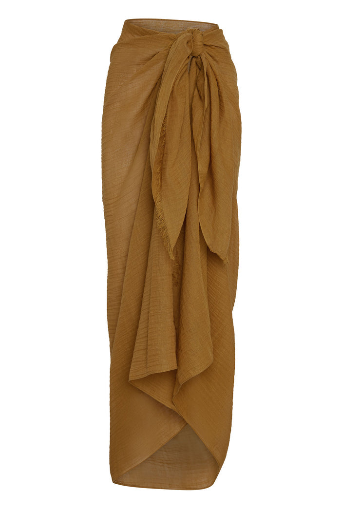 Front view of St Tropez sarong in antique gold crinkle linen tied at waist with long draped panels on white background