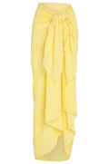 Front view of St. Tropez sarong in Meyer crinkle linen showing tied front knot, raw frayed edge and semi-sheer yellow fabric on white background