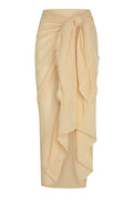 Front view of St. Tropez sarong in raffia crinkle linen showcasing tied side knot and cascading ruffle on white background