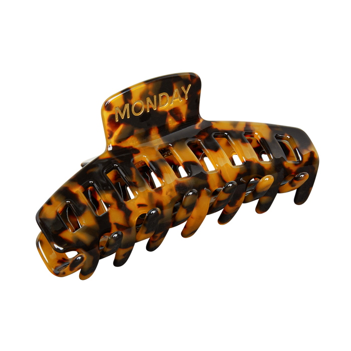 Tortoiseshell hair claw clip with gold 'MONDAY' lettering