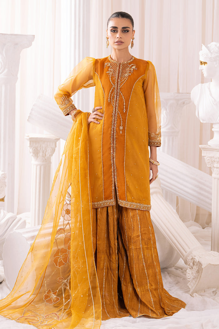 Front view of NAQSHI Sumbul mustard organza shirt highlighting embellished near-neck neckline and princess panel details