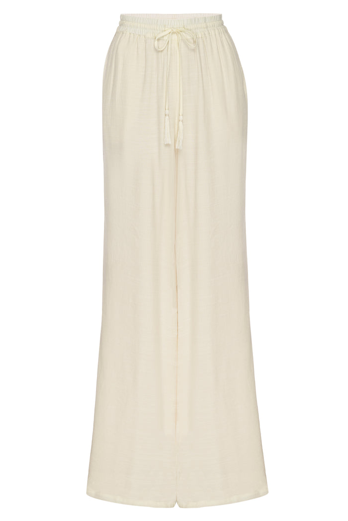 Front view of Tahiti Pant in ivory showing wide leg and drawstring waist with tassel ties on white background