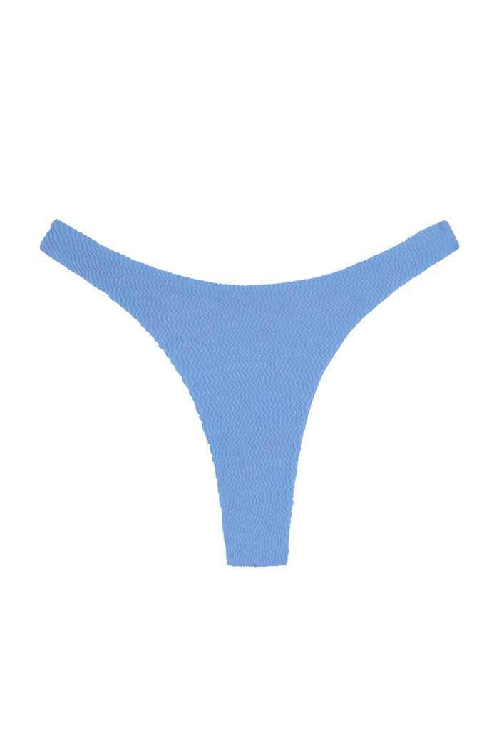 Flat lay of Tamarama Bottom in Azure Crinkle showcasing crinkled textured fabric and thong cut on white background