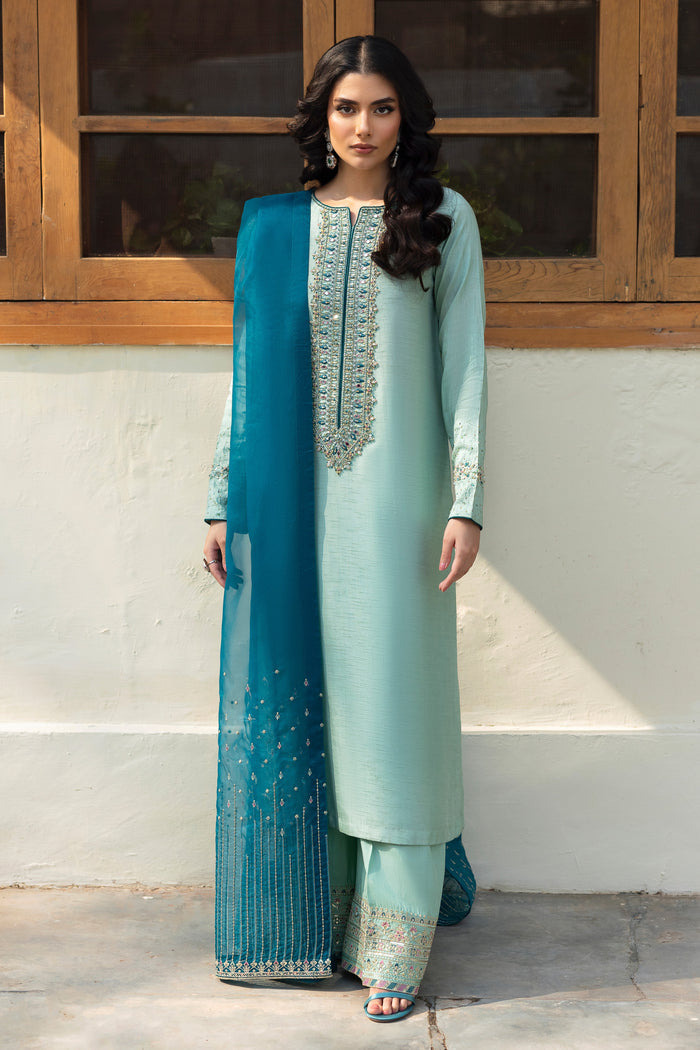 NAQSHI Tania aqua‑teal raw‑silk straight‑cut shirt with boat neckline and sleeves adorned in adda embroidery—kora, dabka, sitara, crystals & teal piping.