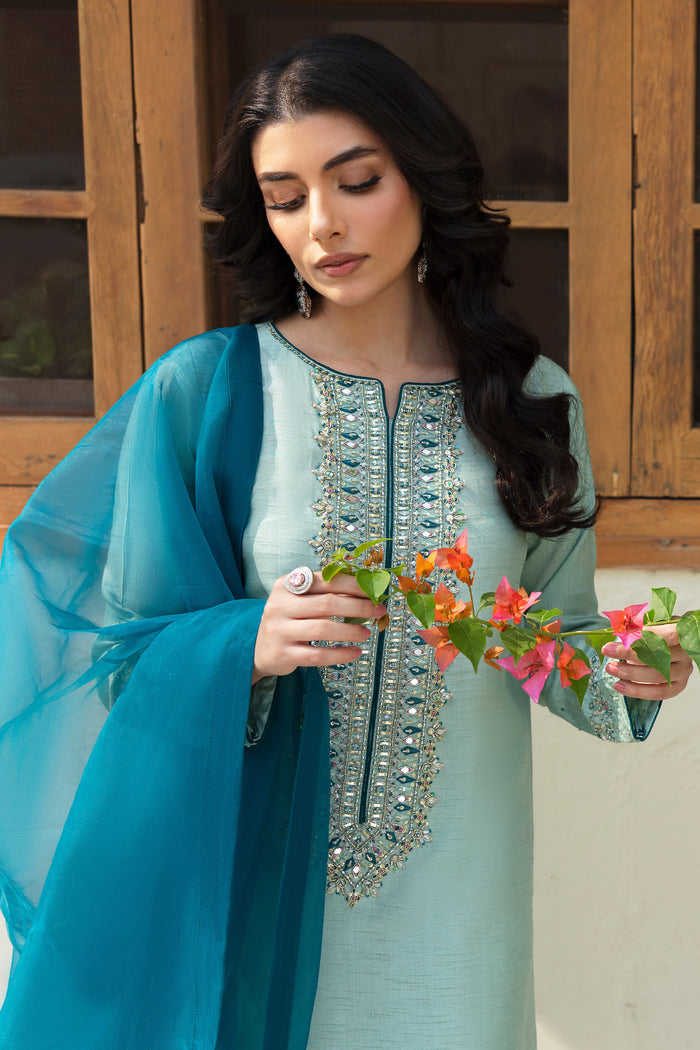 Detailed shot of NAQSHI Tania shirt sleeve showing intricate adda work—kora, dabka, cut dana, pastel stones and mirror embellishments on aqua fabric.