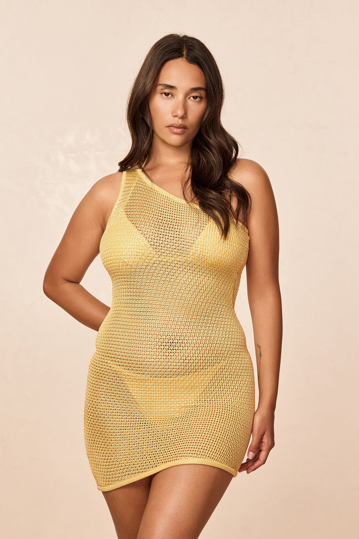 Front of Taormina Dress in Meyer Treble Knit showing one-shoulder neckline, asymmetrical mini hem, sheer knit