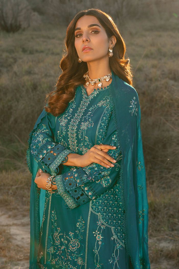 Portrait close up highlighting round neckline loops embroidery sequins and tilla work on Tara zinc lawn shirt