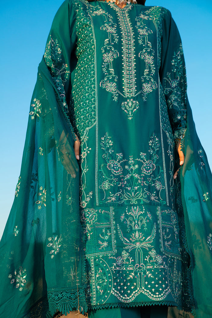 Detailed close up of front shirt embroidery pattern and sleeve trims on zinc ready to wear women 3 piece suit
