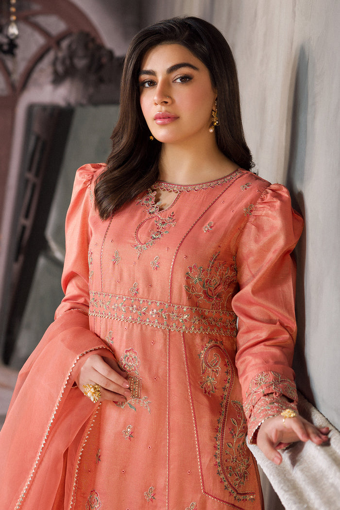 Portrait view highlighting boat neckline with keyhole and embroidery detail