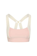 Front view of Tash Bra in heather powder pink and ivory showcasing crossed ivory straps joined by a gold ring and a wide underbust band on a white background