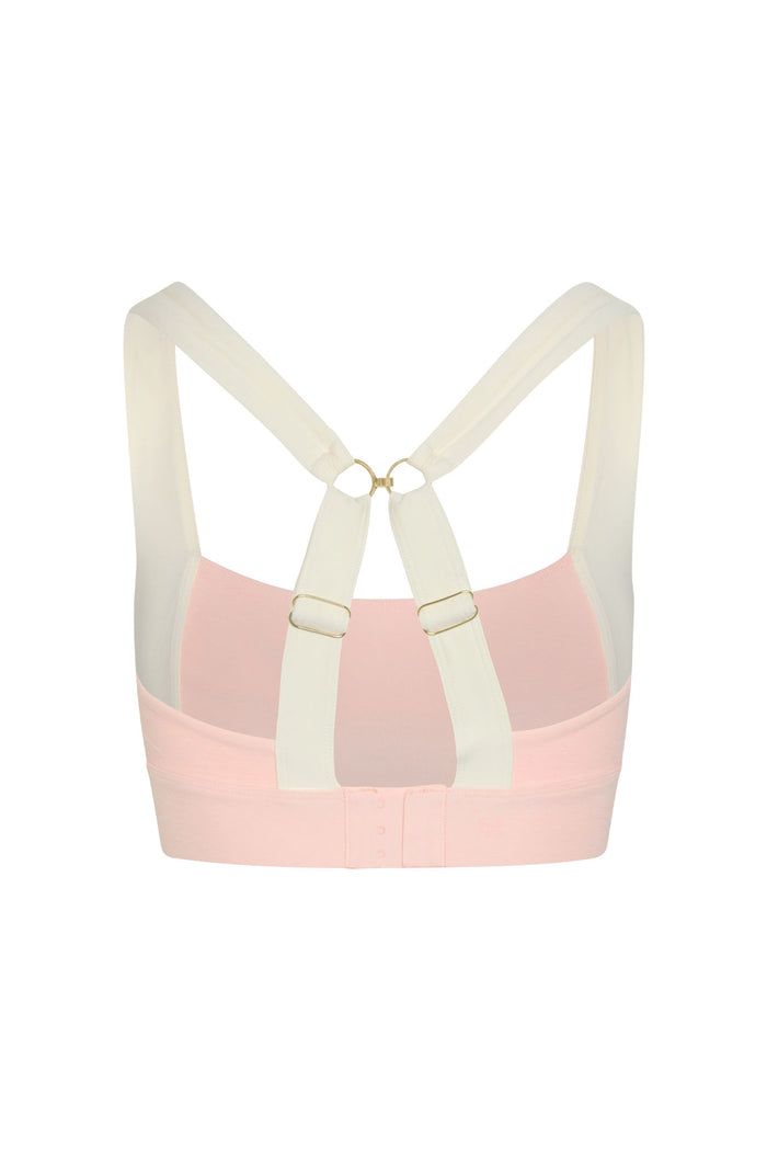 Back view of Tash Bra in Heather Powder Pink/Ivory showing racerback ring, adjustable ivory straps and three-row hook-and-eye closure