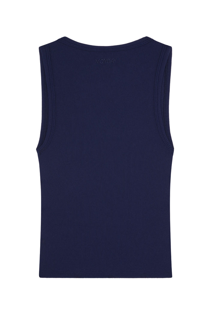 Back view of Tash Tank in Midnight showing thin rib texture and subtle embroidered MONDAY logo on white background