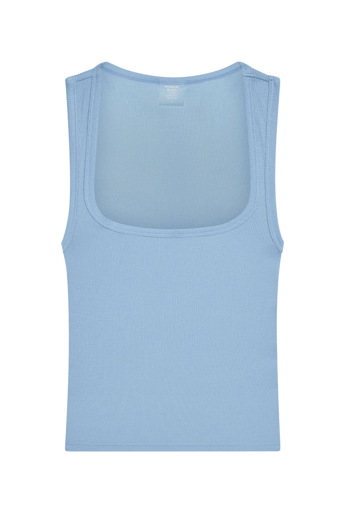 Front view of Tash Tank Long in sky lightweight rib showcasing wide square neckline and thin rib texture on white background
