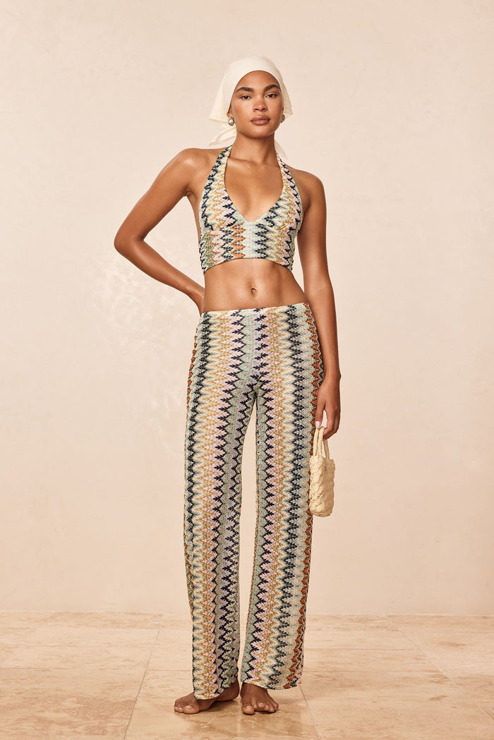 Front view of Toulon Pant Porto Cervo Multi showing high-waist zigzag knit pants on model against a beige background