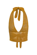Front view of Toulon top in antique gold lace crochet, lined deep-V halter with neck tie on white background