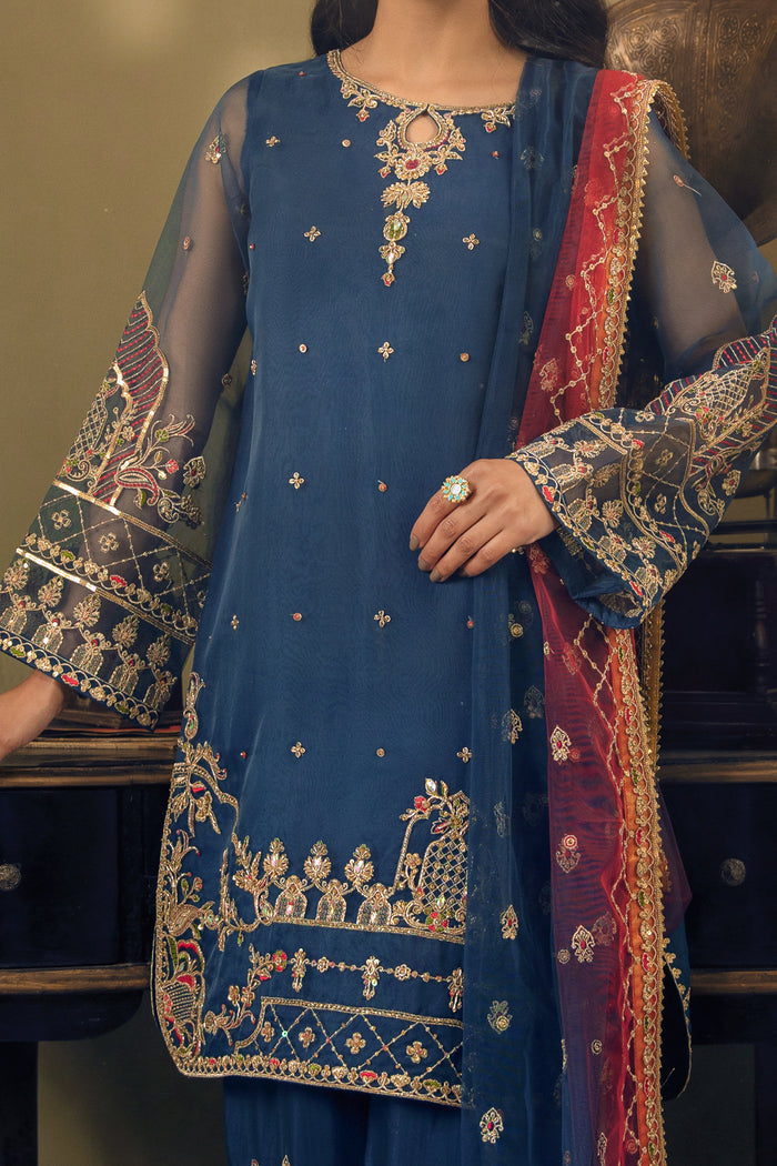 Front close view of Tropicana dress highlighting hand embellishment, zardozi work and embroidered shirt borders