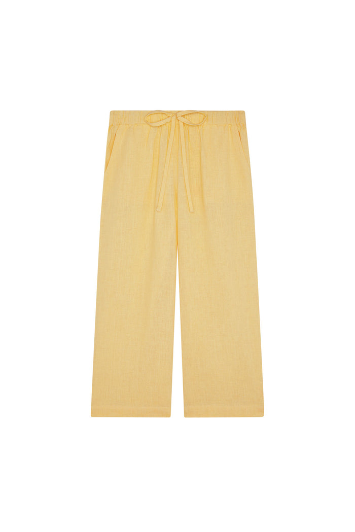 Front view of Tuscany Pant Kids in honey, wide-leg cropped with elastic drawstring waist and side pockets on white background