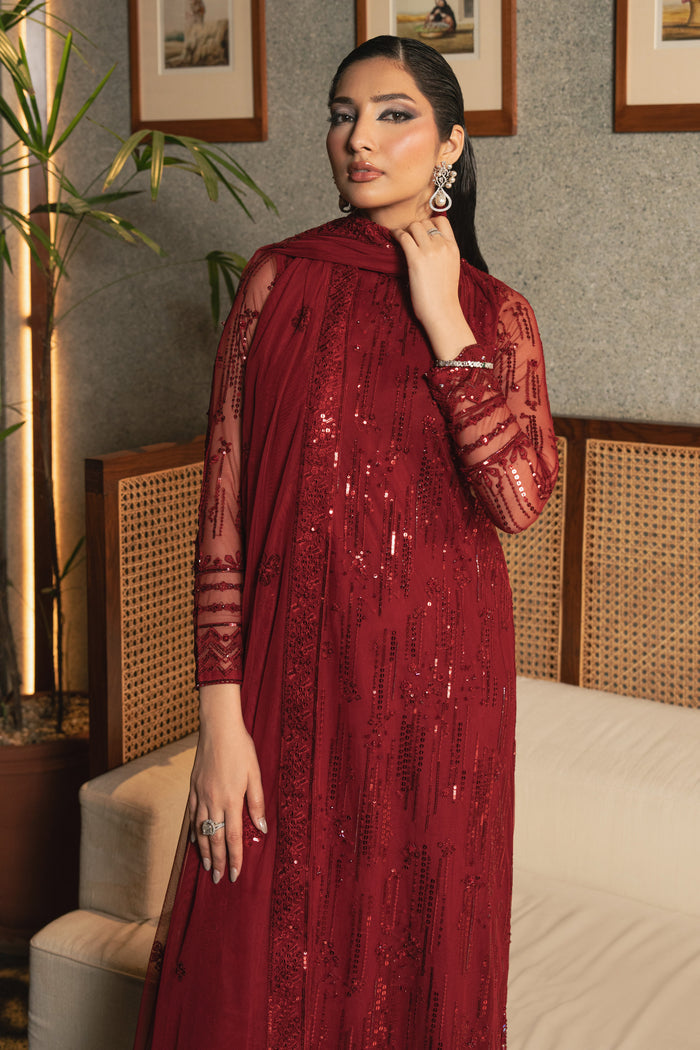 Full front view of NAQSHI Valentina rose red net outfit showing high-neck shirt, all-over embroidery, sequins, adda work, and straight trousers.