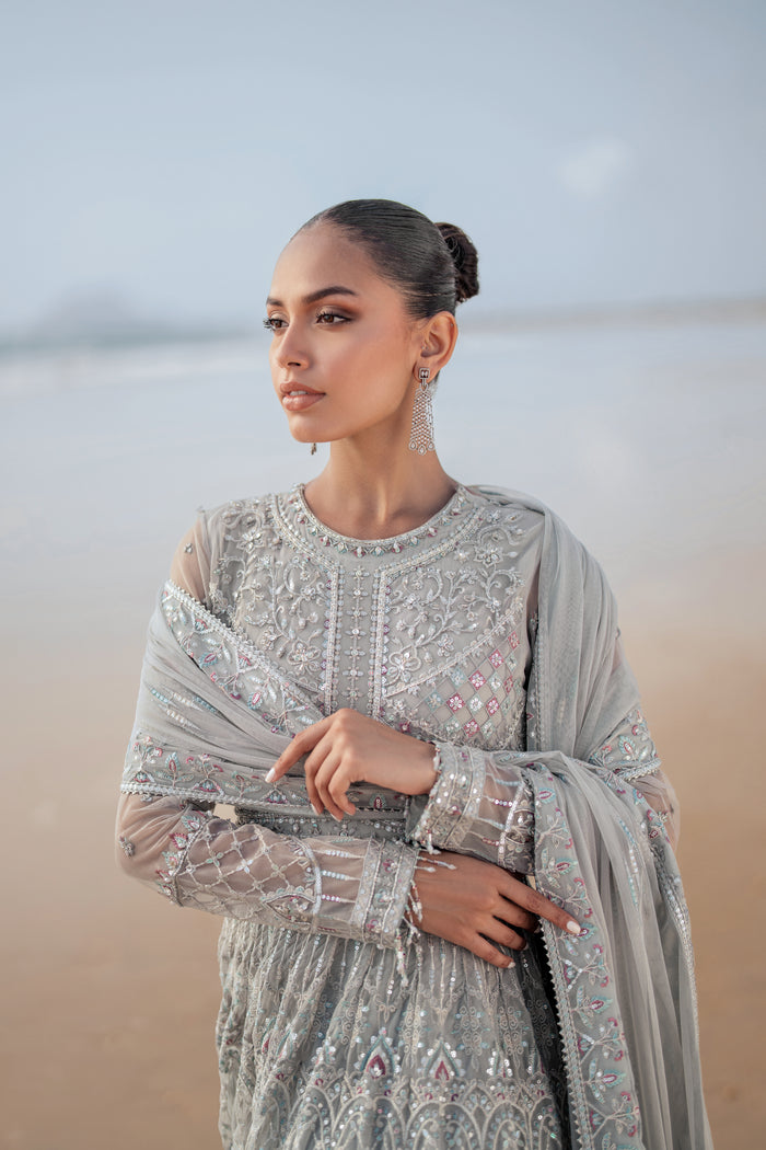 Detailed shot of NAQSHI Valeria sleeve cuff featuring dense embroidery with sequin play, handmade hangings and contrasting floral motif border trim.