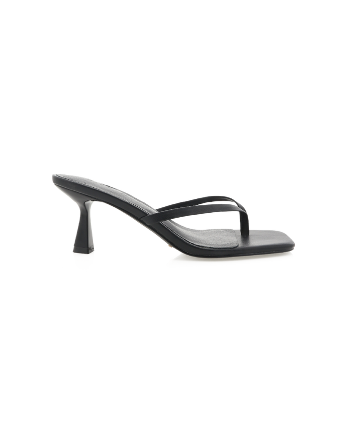Women's black leather mid-heel thong sandal with square toe and low flared heel, side profile.
