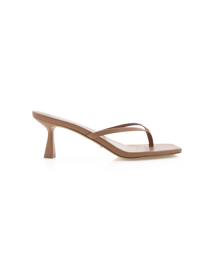 Tan leather heeled thong sandal, square toe and flared mid-heel, side profile on white background.