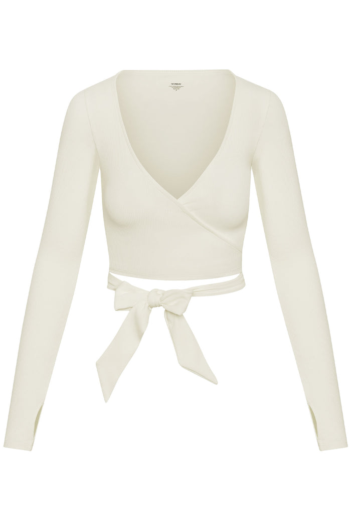 Ivory ribbed long-sleeve wrap crop top with V-neck and waist tie bow, small 'MONDAY' neck label.