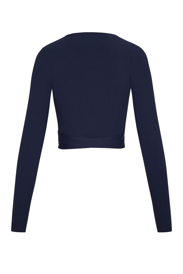 Back view of Yosemite Top in Midnight thin rib showcasing long sleeves and wrap ties at the waist on white background