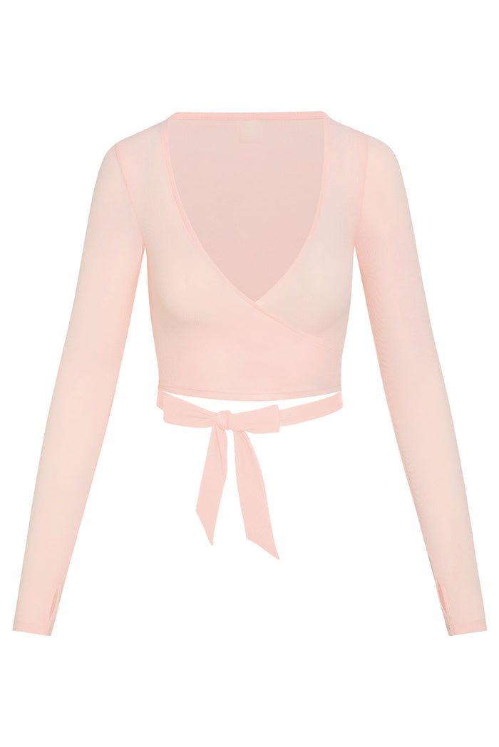 Front view of Yosemite Top in powder pink rib, cropped wrap V-neck with long sleeves and tie-waist bow on white background