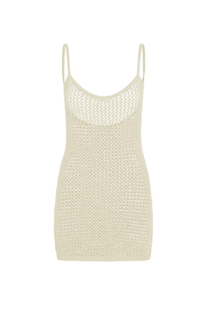 Front view of Zanzibar Mini Dress in ivory petit crochet, fitted open-knit design with thin spaghetti straps on white background
