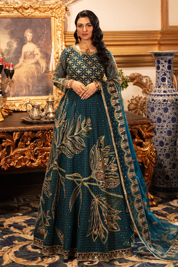 Naqshi zeemal zinc-grey organza choli with boat neckline adorned in contrasting hand‑adda embroidery & sequins, paired with geometric sequin jaal lehenga and matching organza dupatta.