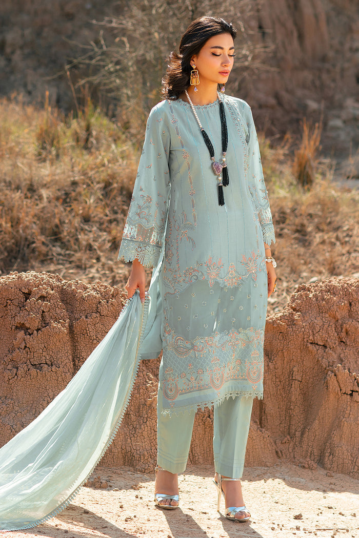 Front standing view showing aqua long shirt with detailed embroidery and organza dupatta lace border festive wear dress