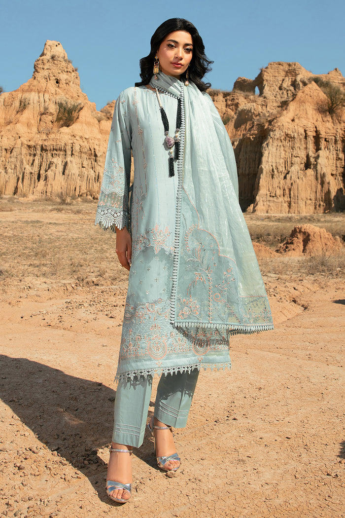 Walking pose of Zenaria aqua ready to wear 3 piece suit with straight shirt and neat trouser cut
