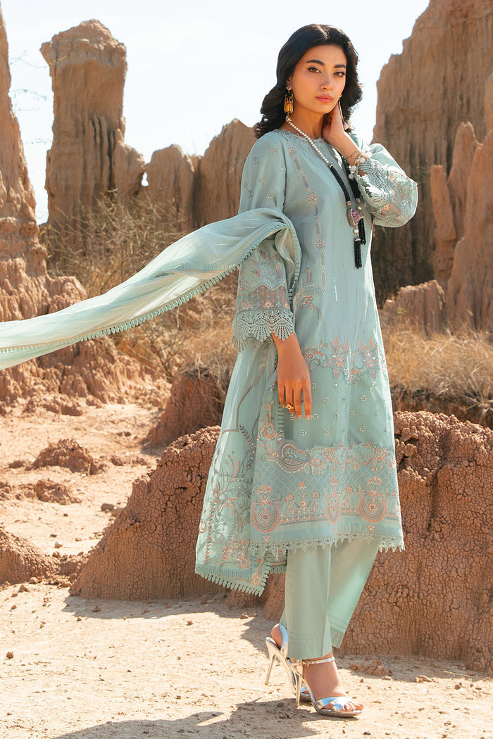 Side angle of aqua embroidered lawn shirt with flowing organza dupatta women gathering wear outfit