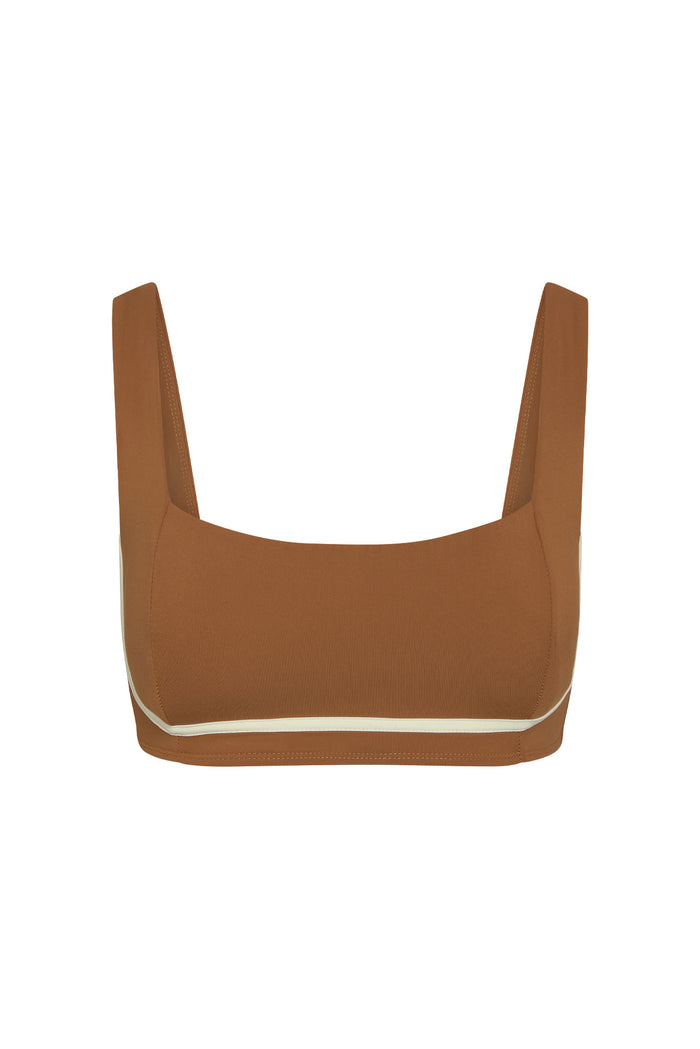 Front close-up of Zion Bra in caramel with ivory trim showing square neckline, wide straps, contour seaming, and underbust support on a white background