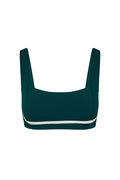 Front view of Zion Bra in evergreen with ivory contrast band showcasing square neckline and wide straps on white background