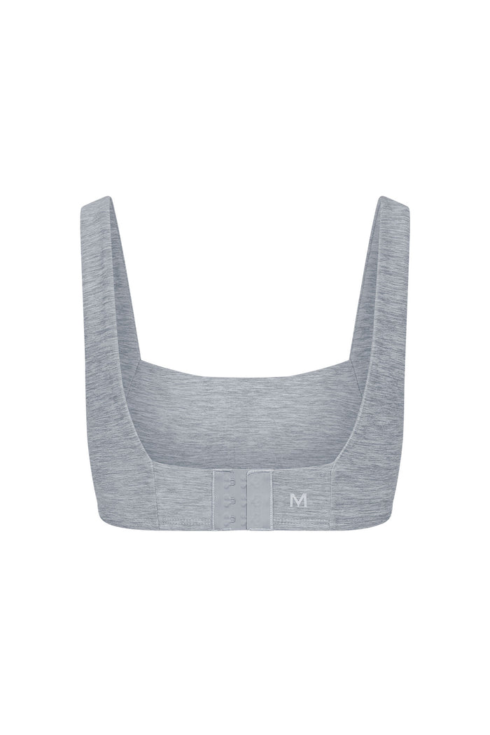 Gray heather wireless bralette back view with three-row hook closure and printed M size label.