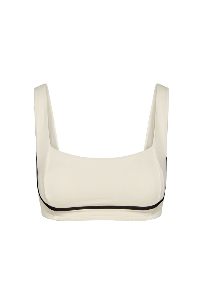 Ivory square-neck sports bra with wide straps and black contrast piping along the underbust