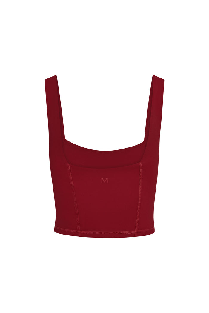 Front view of Zion Tank in cherry showing square neckline, contour seaming and structured underbust with white background