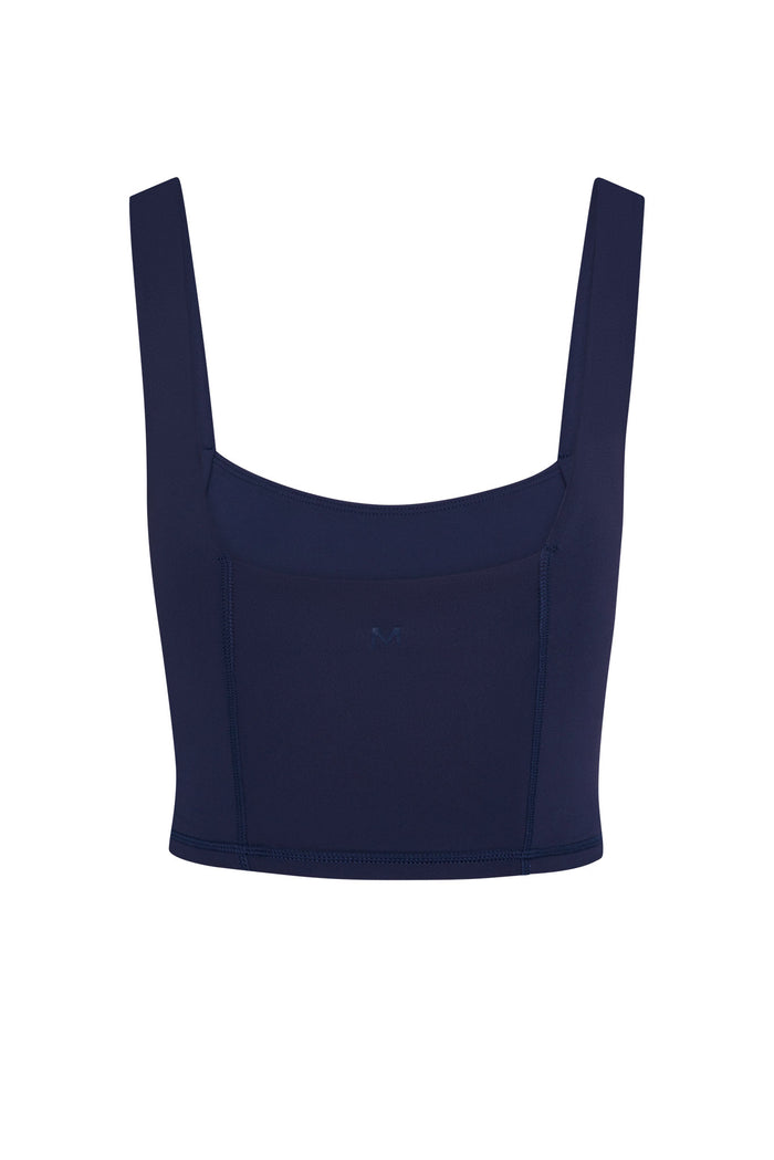 Front view of Zion Tank in midnight showcasing square neckline, wide straps, cropped fit, and exposed seam details on white background