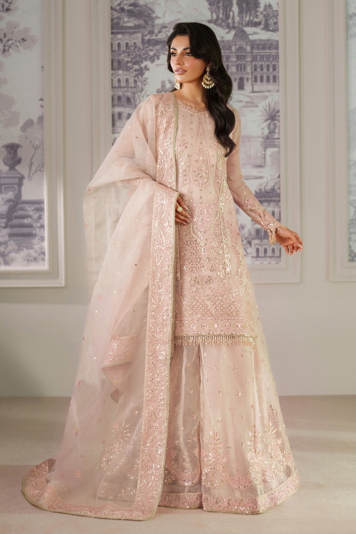 Zri by NAQSHI full front view—peach organza outfit with embroidery, sequin spray, broad neckline and motif detail